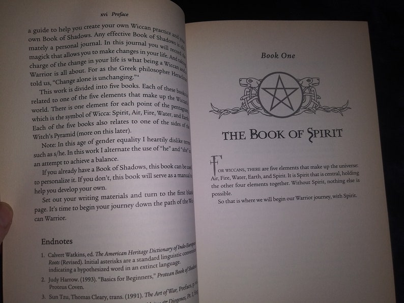 May include: Open book with a white background and black text. The title of the book is "The Book of Spirit". The book is about Wiccan practices and the five elements of the universe: Air, Fire, Water, Earth, and Spirit.