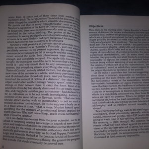 May include: A page from a book discussing the concept of scientific discovery and the importance of recognizing relationships between seemingly unrelated facts. The text highlights the work of Sir Isaac Newton and Albert Einstein as examples of groundbreaking discoveries that emerged from connecting seemingly disparate ideas.