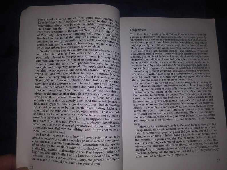 May include: A page from a book discussing the concept of scientific discovery and the importance of recognizing relationships between seemingly unrelated facts. The text highlights the work of Sir Isaac Newton and Albert Einstein as examples of groundbreaking discoveries that emerged from connecting seemingly disparate ideas.
