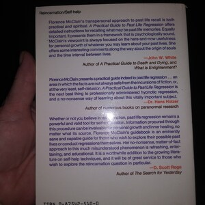 May include: Book cover with a white background and black text. The title of the book is "A Practical Guide to Past Life Regression". The book is about reincarnation and self-help. The back cover features quotes from other authors about the book.