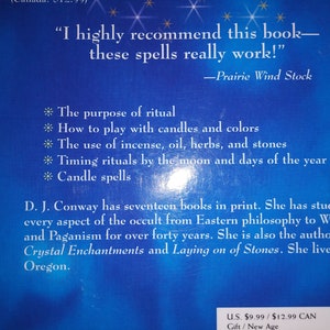 May include: A book cover with a blue background and white text. The text includes a recommendation for the book, a list of topics such as rituals and spells, and author information. The book is about Wicca and Paganism.