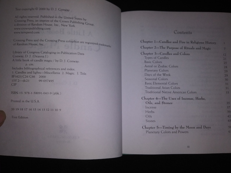 May include: Open book with text on both pages. The left page has copyright information, including the title "A little book of candle magic" by D.J. Conway. The right page displays the table of contents, listing chapters on candles, rituals, and magic.