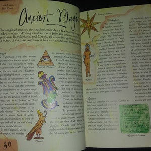May include: Open book with colorful illustrations and text about ancient magic. The book covers Egyptian, Babylonian, and Greek magic. The text includes the words "Ancient Magic", "Egypt", "Babylon", and "Greece".