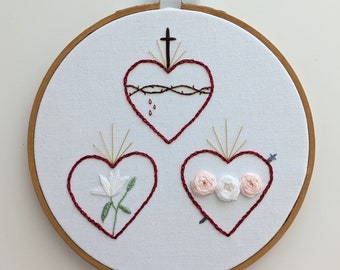 Hearts of the Holy Family Embroidery Art. Finished embroidery piece.