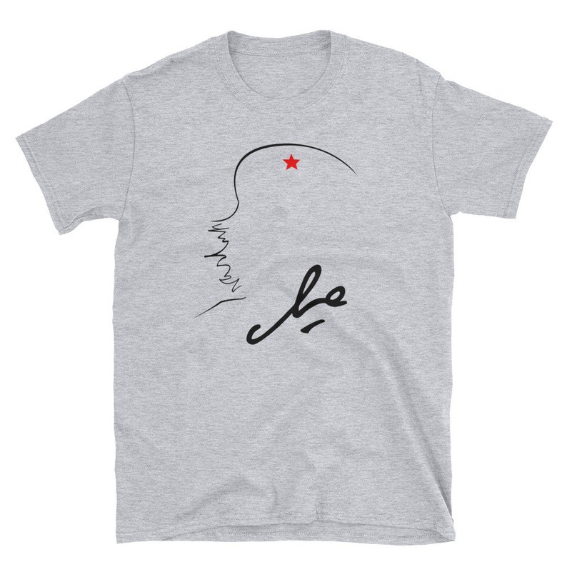 May include: A gray t-shirt with a black line drawing of a profile with a red star above it and the word "Che" written in black cursive.