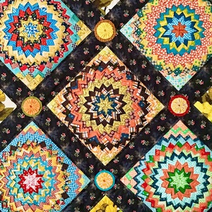 May include: A vibrant patchwork quilt with a repeating geometric design. The quilt showcases diverse fabrics in shades of blue, red, yellow, and orange, arranged in a starburst pattern. The background is a dark floral print.