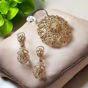 Vintage NOS Signed Trifari Filigree Scrolled Flower Dome Gold Tone Brooch and Clip on Earrings Set