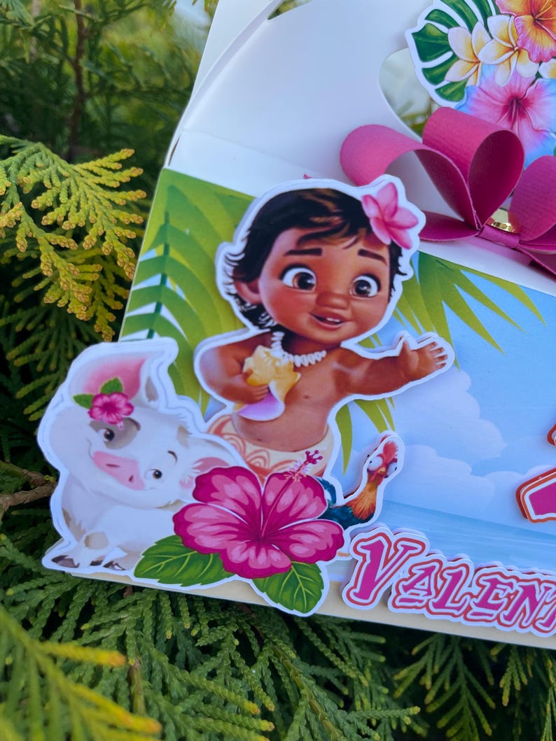 May include: A decorative gift box featuring cartoon characters and tropical flowers. The box has a pink bow and a cutout design. The characters include a girl with a flower in her hair, a pig, and a rooster. The word "Valent" is visible.