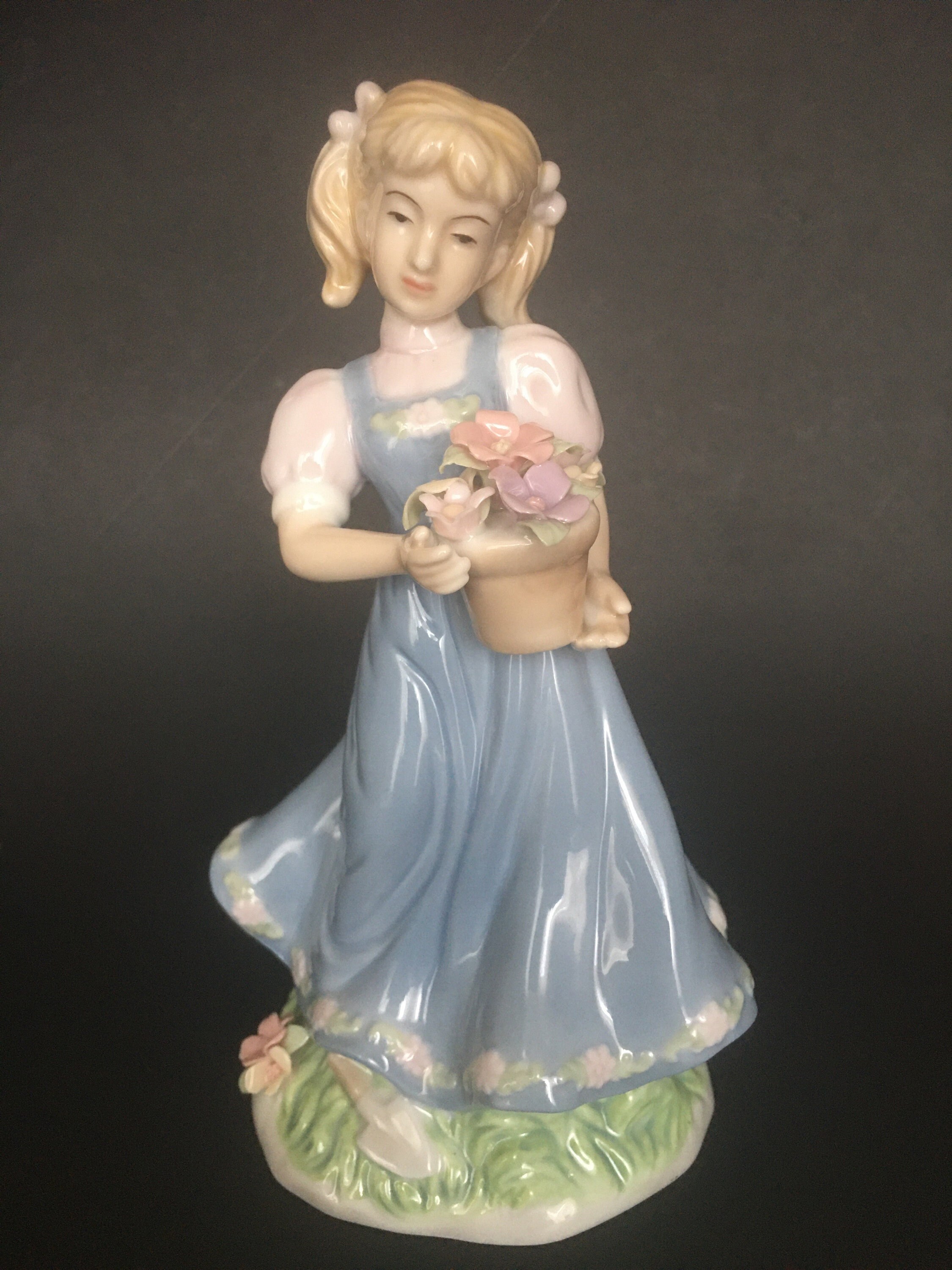 Yvonne Halton Porcelain Figurine  1999 Y.H. Girl with Flower Bouquet.
