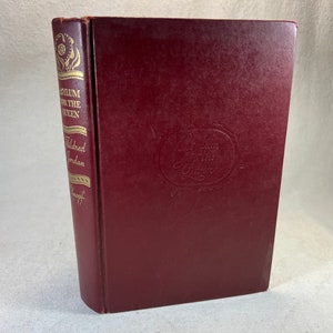 May include: A burgundy hardcover book with gold lettering on the spine. The title is "Platinum for the Queen" by Mildred Jordan. The book is published by Knopf.