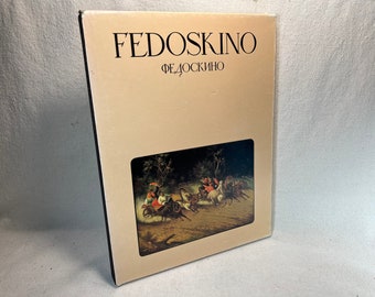 May include: A book titled "FedoSkino" with the Russian word "Федоскино" underneath. The cover features a painting of a horse-drawn carriage with people riding in it.