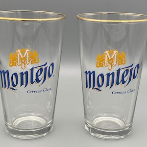 Pair of Montejo Cerveza Mexican Lager Beer Pint Glasses Gold Blue Lettering