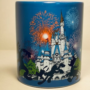 Vintage Walt Disney World Coffee Character Silhouettes Cinderella’s Castle Fireworks on Blue Background