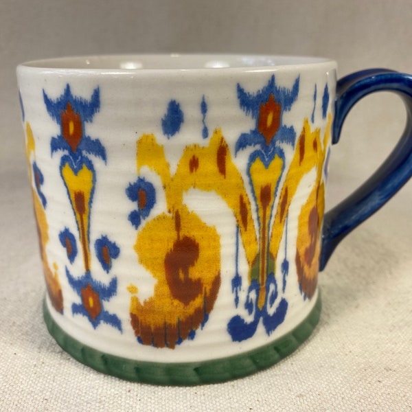 Anthropologie Hand-Decorated Floral Coffee Tea Mug Embossed with Interior Medallion Abstract Design Yellow Blue Green