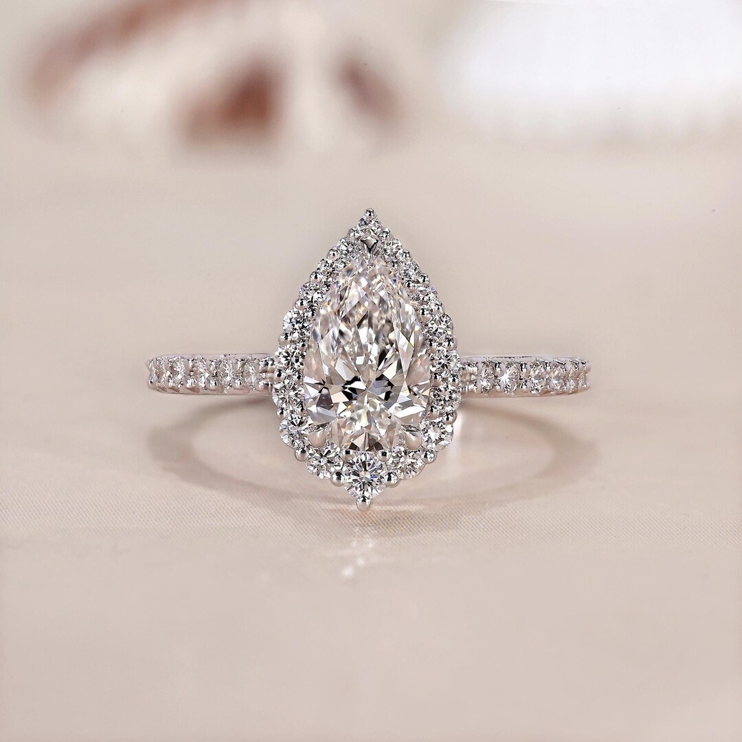 IGI Certified Pear Cut Lab Grown Diamond Graduated Halo Engagement Ring ...