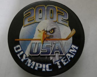 Disco de hockey olímpico de Salt Lake City, EE. UU., 2002, con licencia oficial, nuevo.