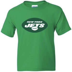 May include: Green t-shirt with the New York Jets logo in white. The logo is a green oval with the words "New York Jets" in white and a white football inside the oval.