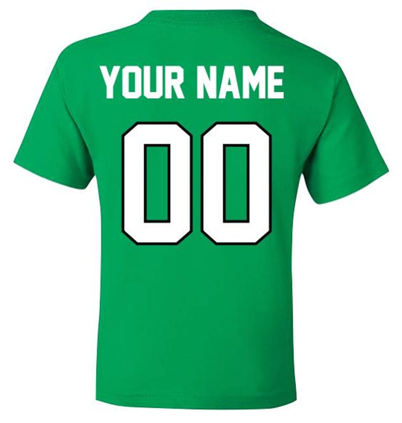 May include: Green t-shirt with white text that says "YOUR NAME" and the number "00" in a white circle with a black outline.