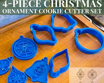 Juego de 4 cortadores de galletas con forma de adorno navideño / Apto para uso alimentario