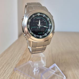 Vintage Casio AMW-707 ana digi watch thermometer world time stainless steel sport watch 2000s multifunction