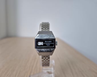 Vintage BULER Digitaluhr mit springender Stunde, Schweizer Uhrwerk, Kaliber EB 8461, Retro-Damenuhr aus den 1970er Jahren mit Stahlarmband