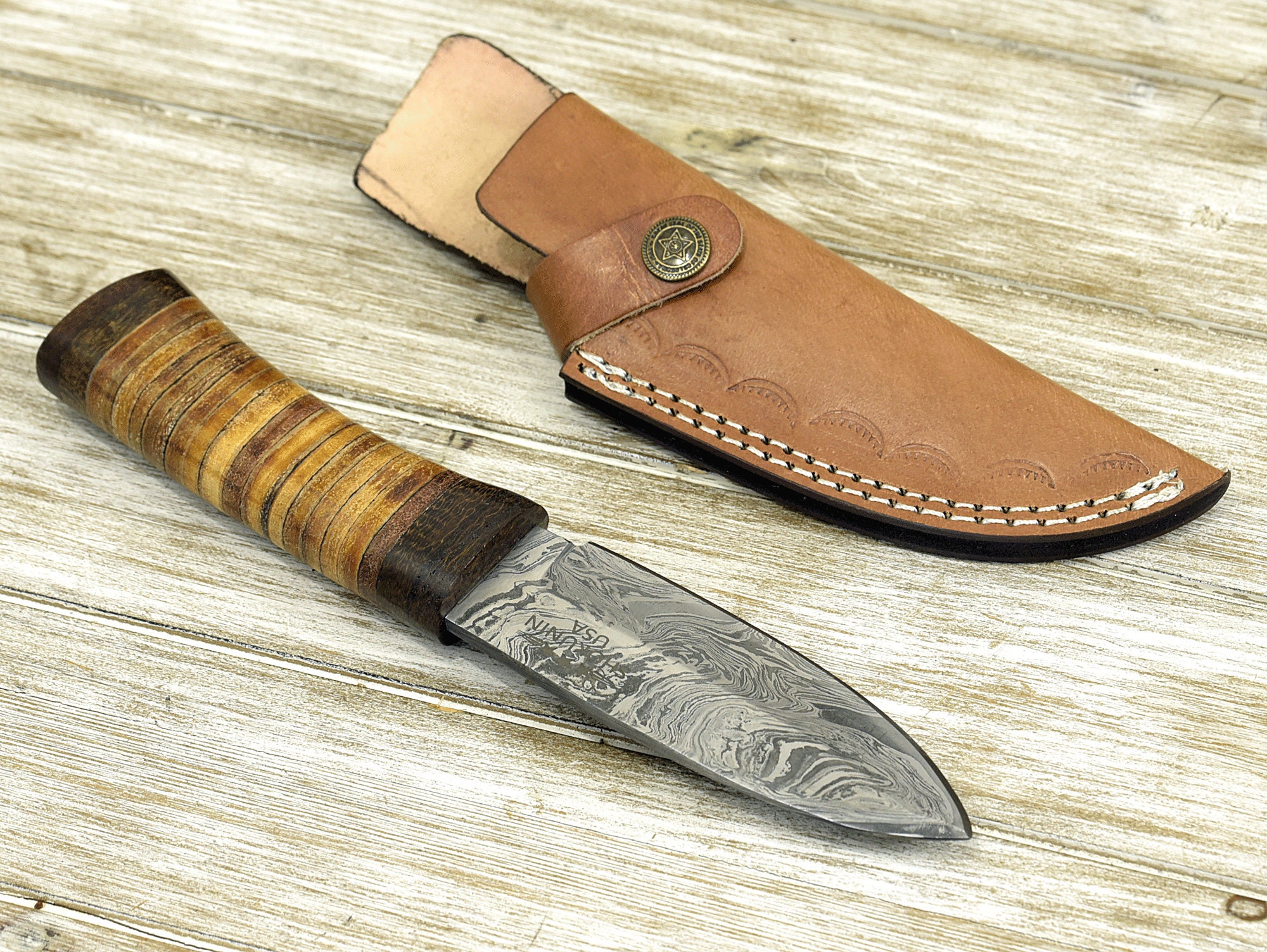 Wrapping droppoint knife handle blinklader