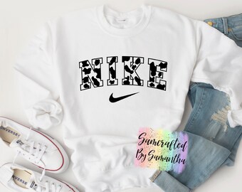 nike cow print sweatshirt