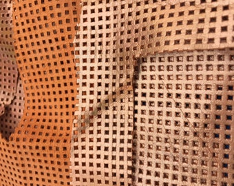 18 - Leather scraps orange perforated shiny. 100g