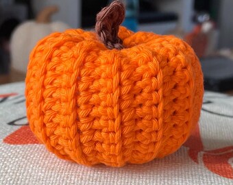 Crocheted pumpkin decorations for Halloween or Autumn