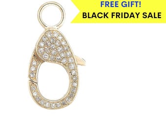 May include: A gold-toned clasp with a round ring at the top and a pave diamond design. The clasp is a popular jewelry finding for necklaces and bracelets.