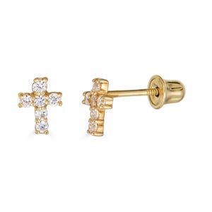 May include: A pair of gold cross earrings with clear cubic zirconia stones. The earrings have a screw back closure.