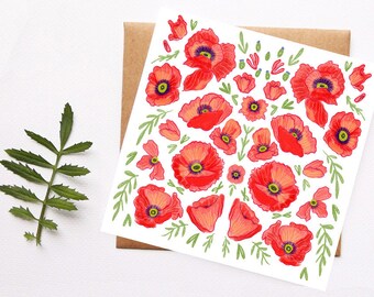 May include: A white card with a red poppy flower pattern. The card is decorated with red poppy flowers, green leaves, and small red hearts. The card is perfect for a greeting card or a decorative piece.