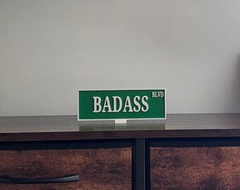 3D Printed Desk or Table sign. Street sign. Badass, Gift Decor, Light Weight. 2.25" x 6" x .28" with stand