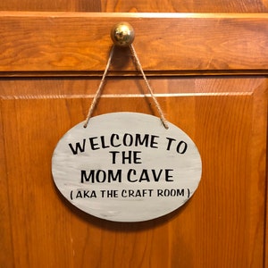 Welcome to the mom cave aka craft room. Wood, Hand Painted, Vinyl Lettering, fun craft room sign. 7.5"x5.5".