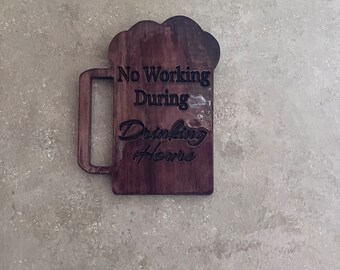 Tabletop CNC cut beer mug. No working during drinking hours. Wood, Tabletop CNC cut Beer mug, Saw tooth hanger, Stained. 6"x4.5".