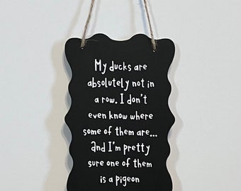 ducks in a row sign. Pigeon, absolutely not in a row, Wood, Hand Painted, Vinyl Lettering. 7.5&quot; x 5.5&quot;.