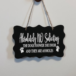 Absolutely No Soliciting The dogs answer the door and they are assholes. Wood, Hand Painted, Vinyl Lettering, No soliciting sign. 7.5" x 5".