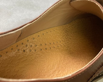 Orthotic leather insole with arch support