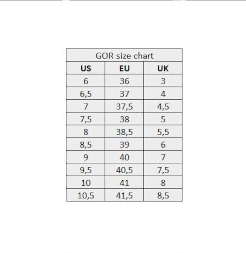 K&ouml;nnte beinhalten: Eine Gr&ouml;&szlig;entabelle f&uuml;r Schuhe, die US-, EU- und UK-Gr&ouml;&szlig;en zeigt. Die Tabelle listet Gr&ouml;&szlig;en von 6 bis 10,5 US, 36 bis 41,5 EU und 3 bis 8,5 UK auf.