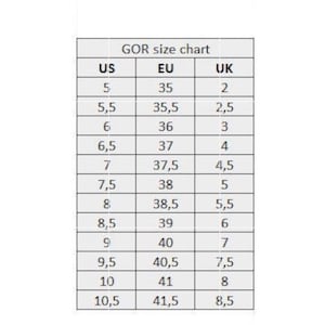 May include: A size chart for women's shoes showing US, EU, and UK sizes. The chart shows sizes from 5 to 10.5 US, 35 to 41.5 EU, and 2 to 8.5 UK.