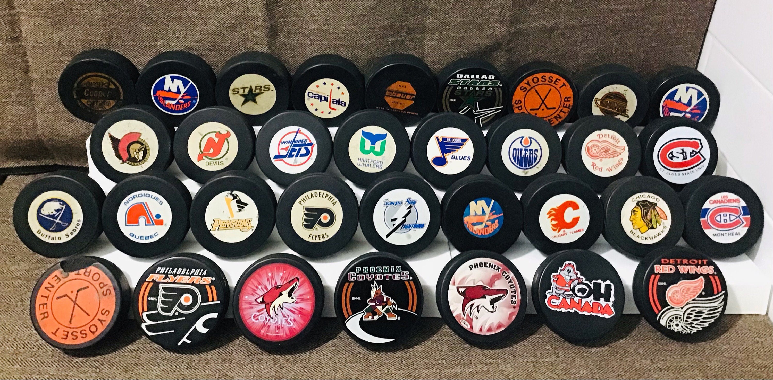 Hockey Puck Lot for sale Only 2 left at 75