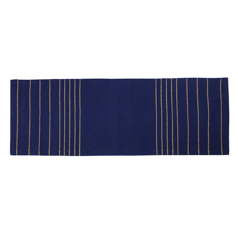 May include: A navy blue table runner with a woven design of thin beige stripes.