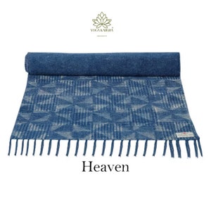 May include: A blue and white patterned yoga mat with fringed edges. The mat is rolled up and the text "Heaven" is printed below it.