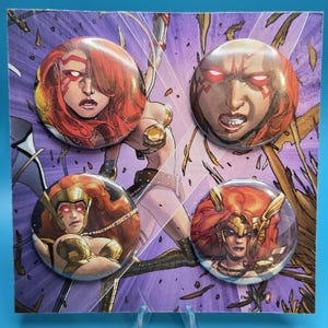 May include: Four round buttons featuring illustrations of a female warrior with red hair and glowing eyes. The buttons are set against a purple background with a comic book style illustration of a woman in armor.