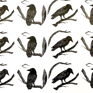 May include: A repeating pattern of black crows perched on branches. The crows are silhouetted against a white background.