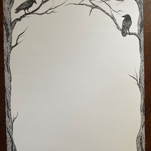 May include: A black and white illustration of two crows perched on bare branches of a tree. The crows are facing opposite directions. The background is white.