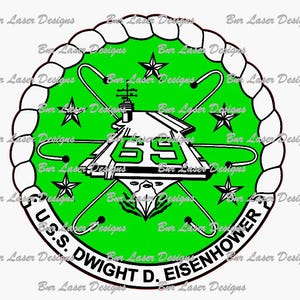May include: A green and white circular emblem with a black and white illustration of a ship and the text "U.S.S. DWIGHT D. EISENHOWER" around the edge.