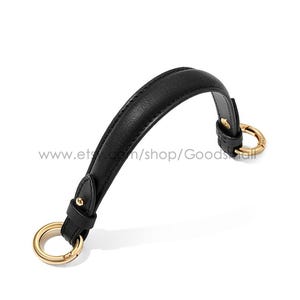 Handtag i läderväska Handtag i läderväska