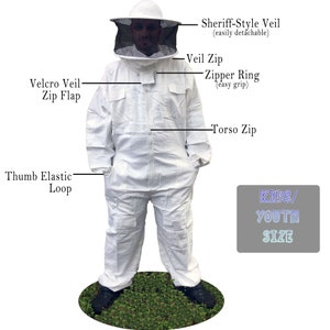 May include: White beekeeping suit with a zippered torso, thumb elastic loops, and a velcro veil flap. The suit also includes a sheriff-style veil with a zipper and a zipper ring. The suit is labeled "KIDS/YOUTH SIZE".