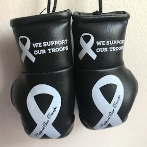 Mini Boxing Gloves We support our Troops available in Black, Blue, Golden, Red, Silver, White.